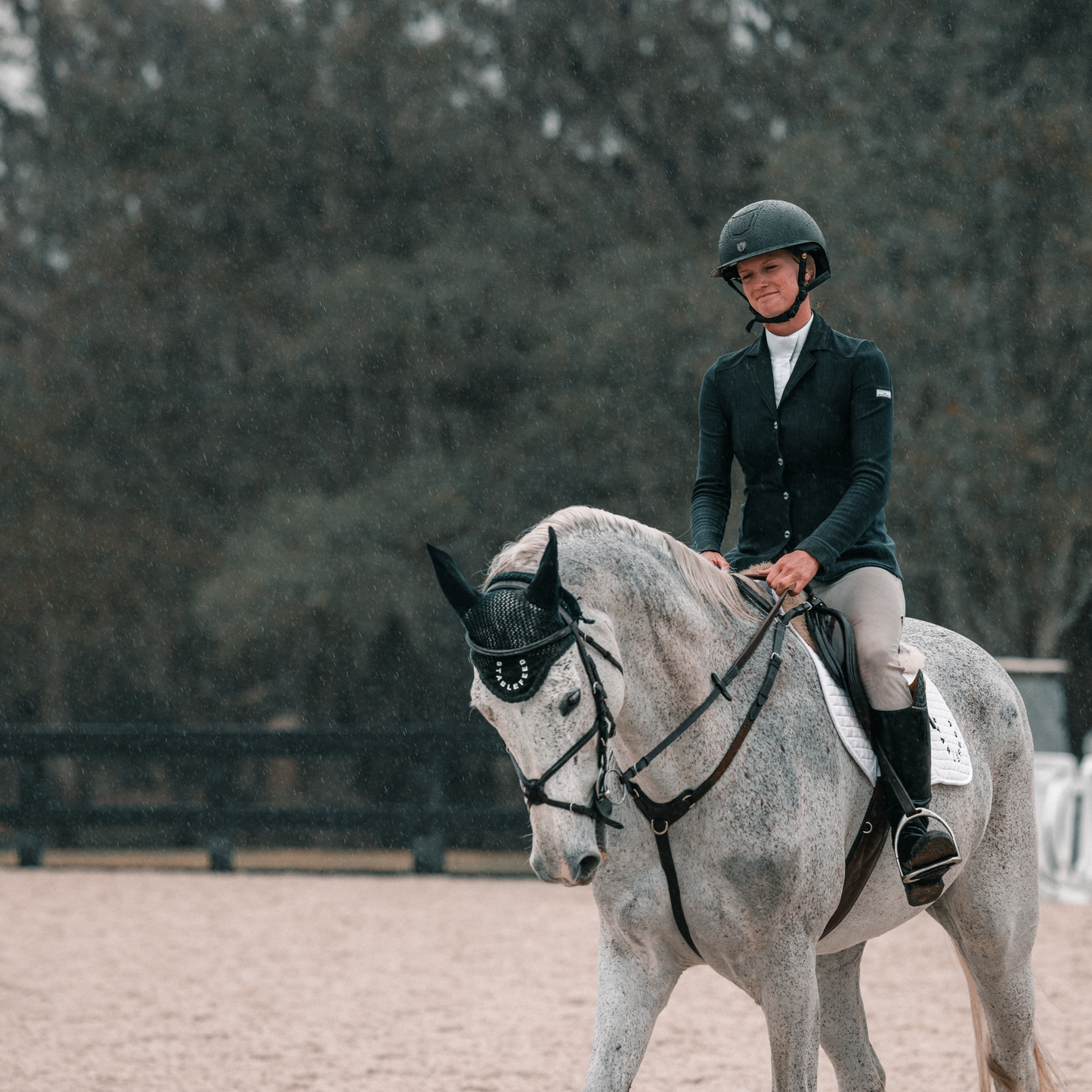 StableFeed rider and stadium jumper, Ashlynn Meuchel, riding over a fence during a competition